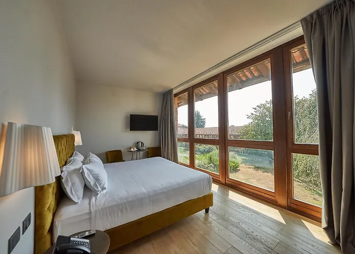 호텔 Relais Cascina Era 4*